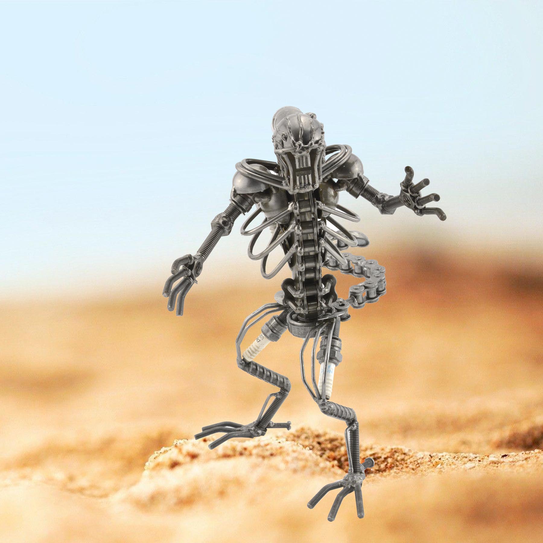 scrap metal alien figure